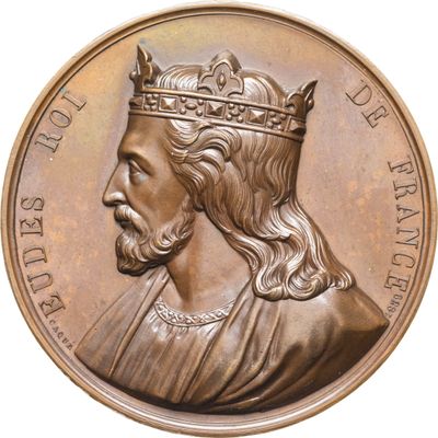 une image montrant un gros plan d'une médaille sur laquelle figure une couronne