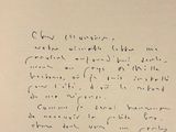 a close up of a piece of paper with writing on it