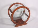 a wooden display case with a glass shelf on it