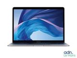 an apple macbook air laptop is shown with a blue background