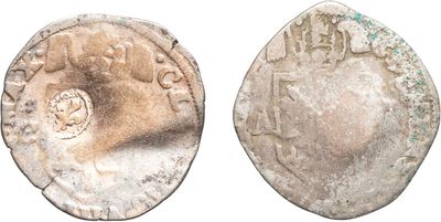 a close up of a coin with an image of a man on it