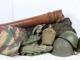 a pile of military items on a white table
