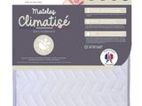 a close up of a baby mattress with a label on it