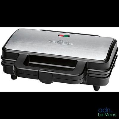 a close up of a sandwich maker on a white background