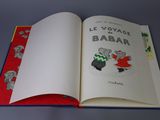 an open book with a picture of a couple of mice on it