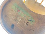 a wooden chair that has been painted with different designs