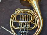 a brass instrument that is sitting on a table