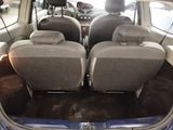 two seats in the back of a small car
