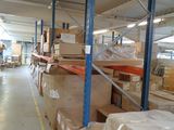 a large warehouse filled with lots of boxes and pallets