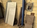 a refrigerator and a refrigerator freezer in a room