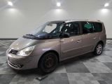 a picture of a silver minivan parked in a room