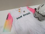 a white shirt with a pink and green design on it
