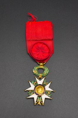 a close up of a medal with a star on it