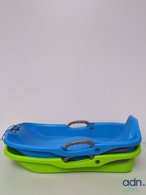 a blue and green tray with a handle on top of it