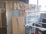 a room that has a lot of boxes on the floor