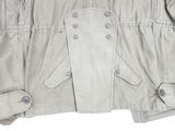 beige jacket with buttons on the front and back of the jacket