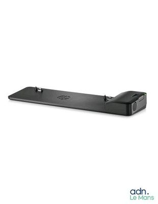 l'arrière d'un ordinateur portable sur lequel est posée une souris