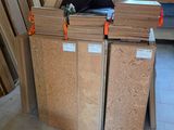 a pile of wood that is sitting on the floor