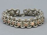 silver and rose gold chainmail bracelet