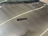 a car that has a sticker on the hood of it