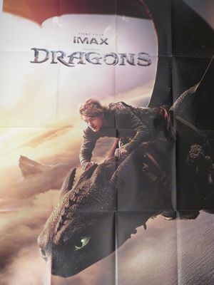 affiche du film « Comment dresser son dragon », sur laquelle on voit un homme chevauchant un dragon