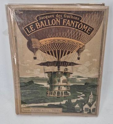 an old book with a picture of a hot air balloon flying over the ocean