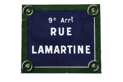 a blue sign that says rue lamarine on it