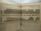 an open book with a drawing of a boat on it
