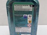 an image of a bottle of hand sanitizer sitting on a counter