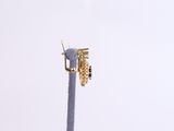a pair of earrings that are on top of a pole