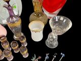 a lot of glass items that are on the table