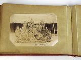 an old photo of a group of people posing for a picture in a book