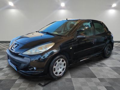 a picture of a black car parked in a garage