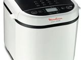 un gros plan d'une machine à pain sur fond blanc