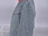 grey wool jacket with red trims and buttons on a mannequin dummy