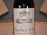 a bottle of wine that is sitting on a table