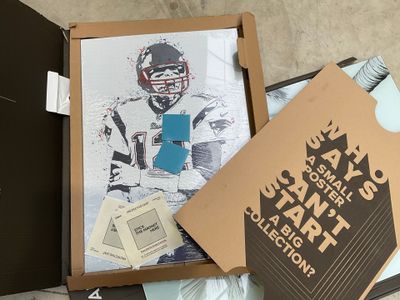 a box with a picture of a football player inside of it