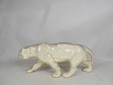 porcelain figurine of a white tiger on a white background