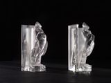 pair of art deco glass bookends of a woman and a man