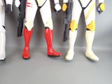 five star wars action figures standing next to each other