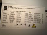 a picture of a sign on a refrigerator that has information on it
