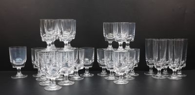 a lot of empty wine glasses sitting on a table