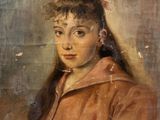 portrait d'une jeune fille en manteau rouge