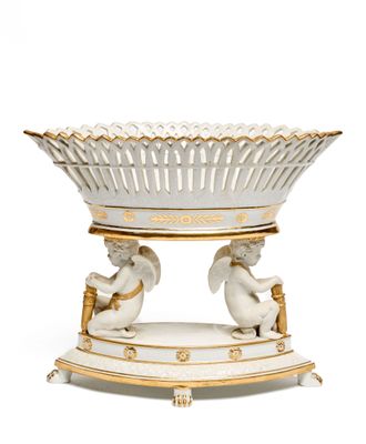 an image of a white and gold bowl with angels on it