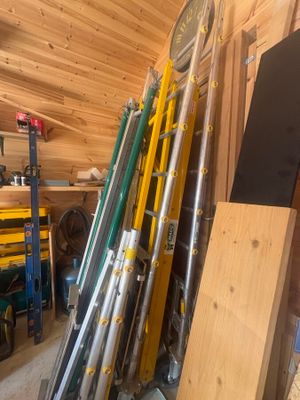 a lot of tools that are stacked up in a room