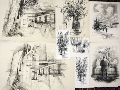 sketches of a house and a tree on a table in a drawing class