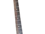 a guitar that is sitting on a stand on a white background
