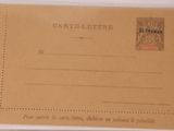 une vieille carte postale sur laquelle figure la photo d'un homme