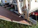 a truck that has a flat bed on the back of it