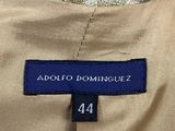 a close up of a label on a tan suit